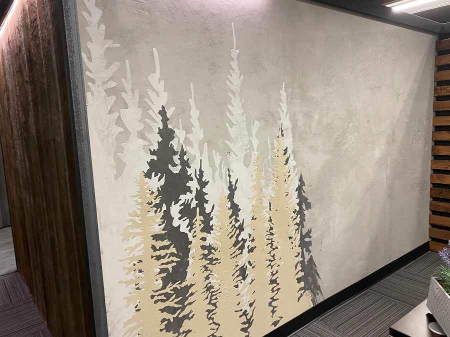 Gray microtopping wall multi color tree stencil in an office setting